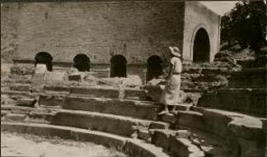 Gortyn. Woman on steps of theater