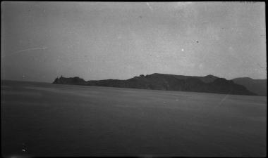 Santa Quaranta. Sea with mountains in distance