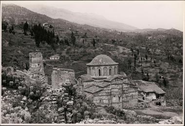 Mystras. Byzantine church with misty mountains in the distance