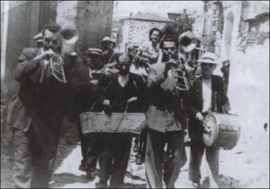 Lesbos Island (Agia Paraskevi) 1952: Musicians accompany a companionship of revellers