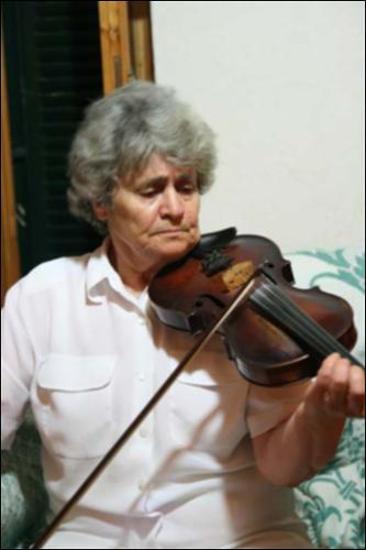 Ikaria Island  (Stavlos) 2008: The  amateur musician Sosa Plakida plays the violin.