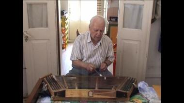 Samos Island (Ano Vathy), 2006: Manolis Anakreon playing the santouri and singing 