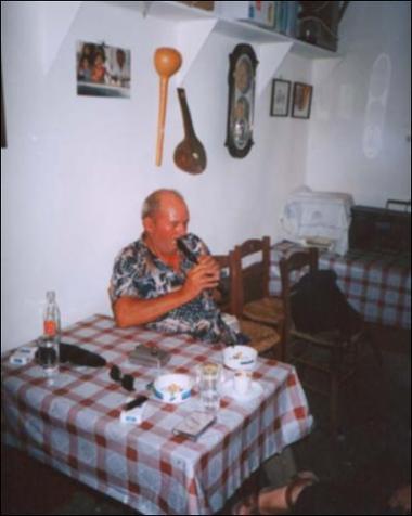 Lemnos Island (Dafni) 2001: Tasos Pardalis plays an improvised flute in a kafeneio (local traditional cafeteria)