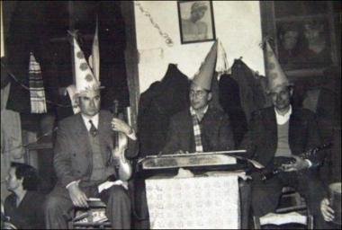 Lemnos Island (Myrina or Mudros), 1950s: A carnival folk feast (glenti) in a kafeneio (local traditional cafeteria)