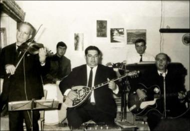 Chios Island (Lithi), 1960s: Religious feast in a kafeneio (local traditional cafeteria)