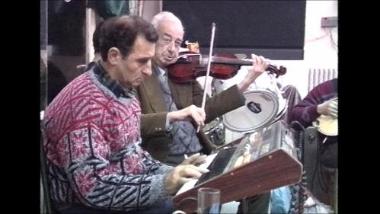 Lesbos Island (Kerameia), 1997: Charilaos Rodanos playing a taqsim (improvisation) during a revelry at a coffee shop