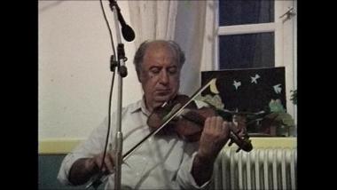 Lesbos Island (Stypsi), 1997: Michalis Kyriakoglou playing the violin and Nikos Valasis singing an amanes