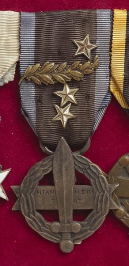 WWI War Cross. 1st Class with a laurel branch and three silver stars and a miniature. (G. Kondylis)