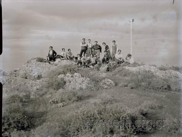 A group of climbers on the top of a mountain.