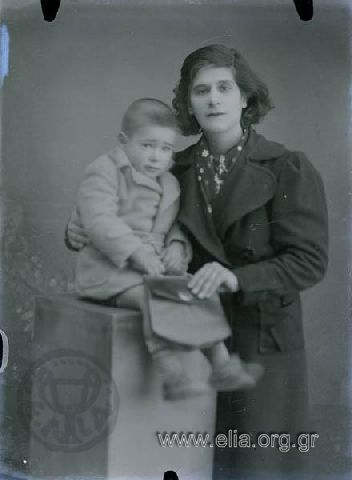 Portrait of a woman and a boy.