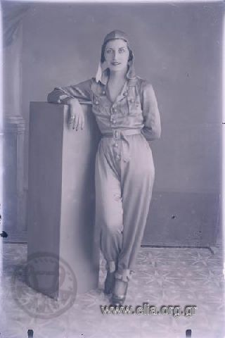 Portrait of a woman in pilot's uniform.