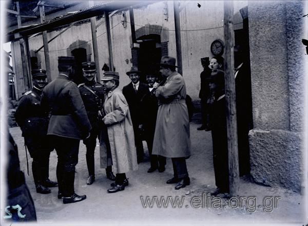 General Xenofon Stratigos and servicemen at a railway station.