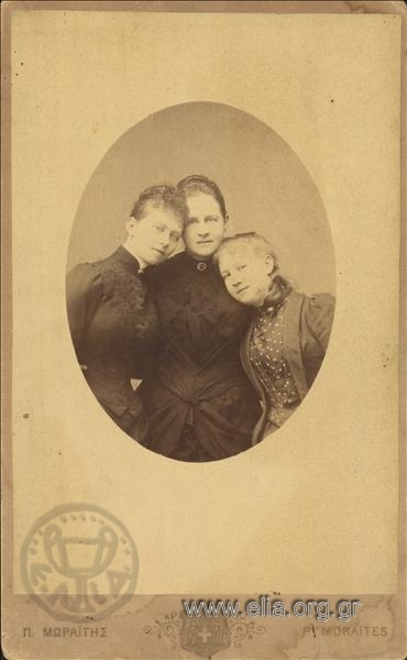 Queen Olga with two young women.