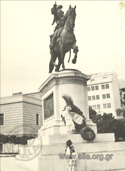 Student laying a wreath.