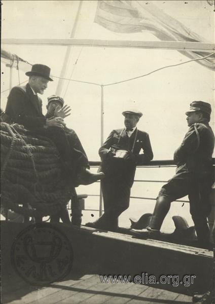 July, Dimitrios Gounaris and Xenofon Stratigos on the deck of a boat sailing from or to Asia Minor.