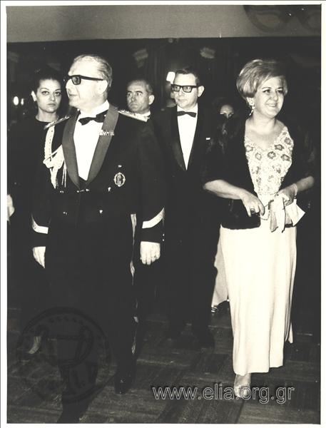 Regent G. Zoïtakis and his wife arriving at an official function