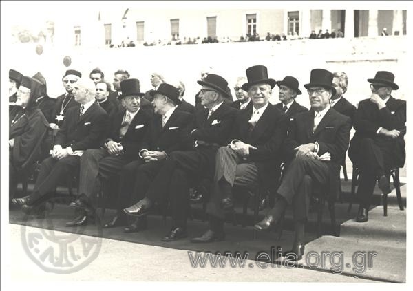 Members of the Georgios Papandreou regime and church officials attend a formal ceremony (military parade?) from the Monument of the Unkown Soldier.