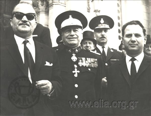 Ioannis Ladas (first from the left) and a top-ranKing police officer at the Cathedral