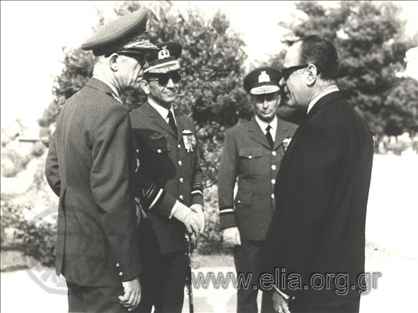 Prime Minister Georgios Papadopoulos conversing with General Odysseas Angelis and Air Marshal.