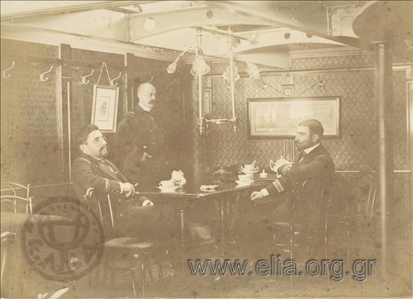 Sofoklis Dousmanis and officers at the officers' mess on board a battleship