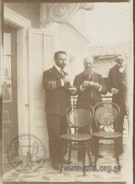 Sofoklis Dousmanis in company drinking coffee.