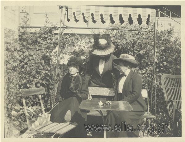 Three women in a coffee-house, Champ Palace.