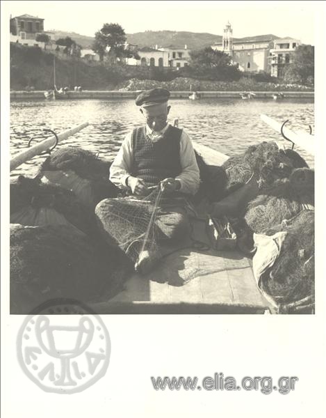 Peran, harbor, fisherman with fishnets