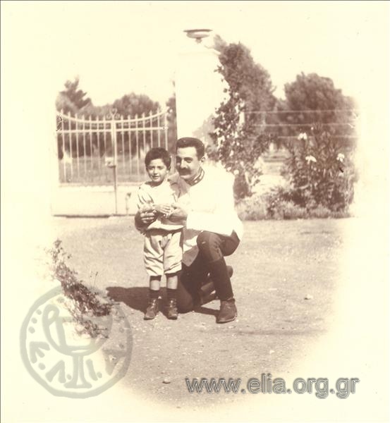 Paul Melas with his son, Miki.