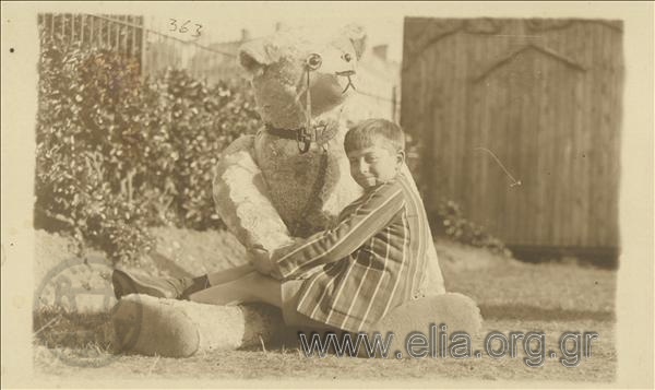 Georgios G. Vasiliadis with a teddy bear