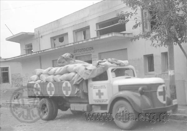 The Red Cross transports flour after the liberation.