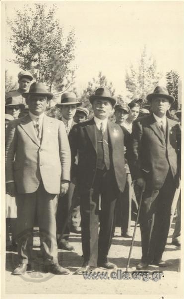 A. Vichos, Municipal Councillor for Athens, and two men at an official ceremony