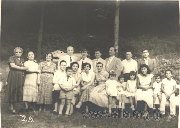 Group portrait of diaspora Greek s  in a countryside.