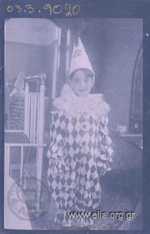 Boy disguised as pierrot