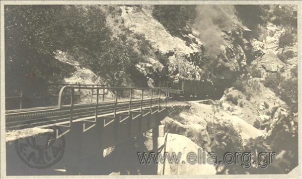 Train coming in a gorge of a Peloponnese mountain