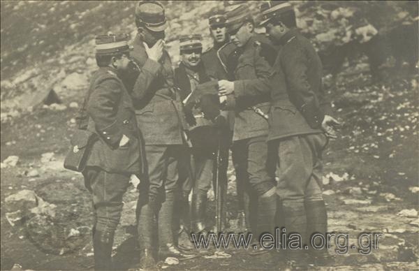 Balkan War I, Crown Prince Georgios showing a document to King Konstantinos somewhere in the front. (From the left) Xenofon Stratigos, Ioannis Metaxas, Prince Alexandros and officer are observing.