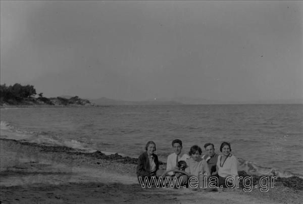 A group of friends at the shore.