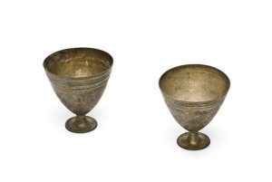 Silver hoders for small porcelain cups, decorated at rim.