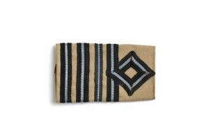 Beige wool epaulet with four light blue stripes, belonged to David Edgar Allalouf (1918-2003).