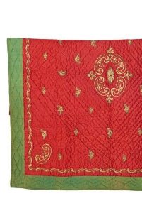 Red and green silk with gold embroidery, Samarias family heirloom.
