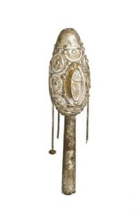 Torah finial in elongated egg shape, tin medallions attached to wooden core.