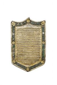 Brass Torah shield with enamel, inscribed with the Ten Commandments.