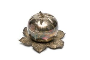 Apple-shaped silver container with cover and leaf-shaped stand.
