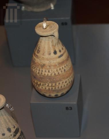 Clay alabastron with painted decoration