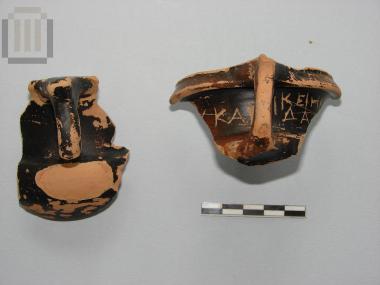 Two fragments from a black glaze kantharos