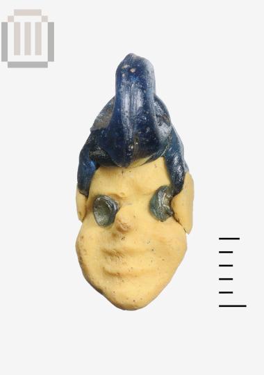 Glass pendant in human shape from the Kalamas River Dam