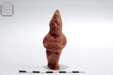 Terracotta figurine of a male dwarf with projecting abdomen