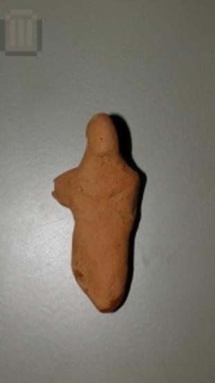 Female clay-figurine from the Sanctuary of Nymphs - Koudounotrypa cave