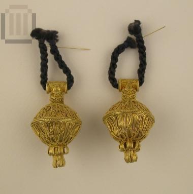 Two gold pendants