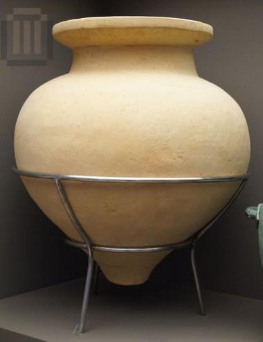 Clay funerary pithos with pointed foot/base