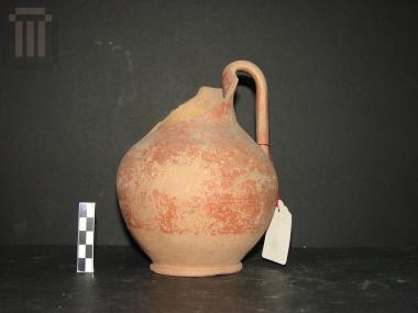 Red-glazed trefoil oinochoe